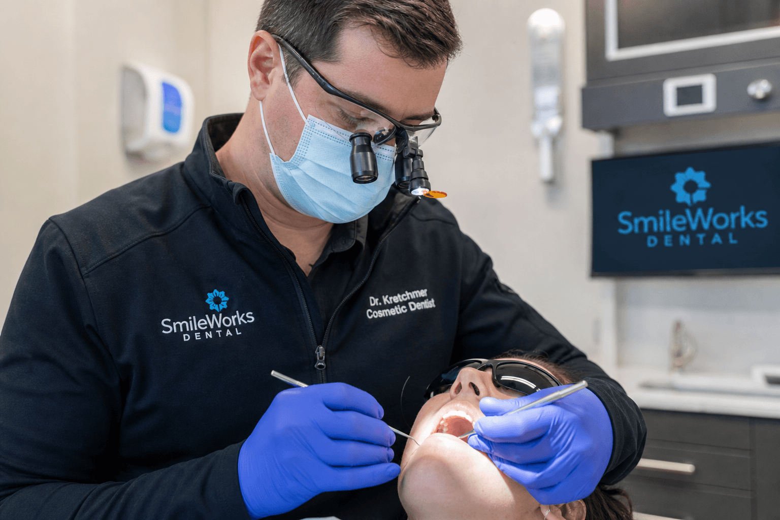 Dentist performing treatment at SmileWorks Dental